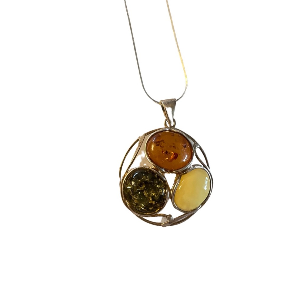 Round Multi Colored Amber Pendant, little longer than a chocker. Silver chain.
